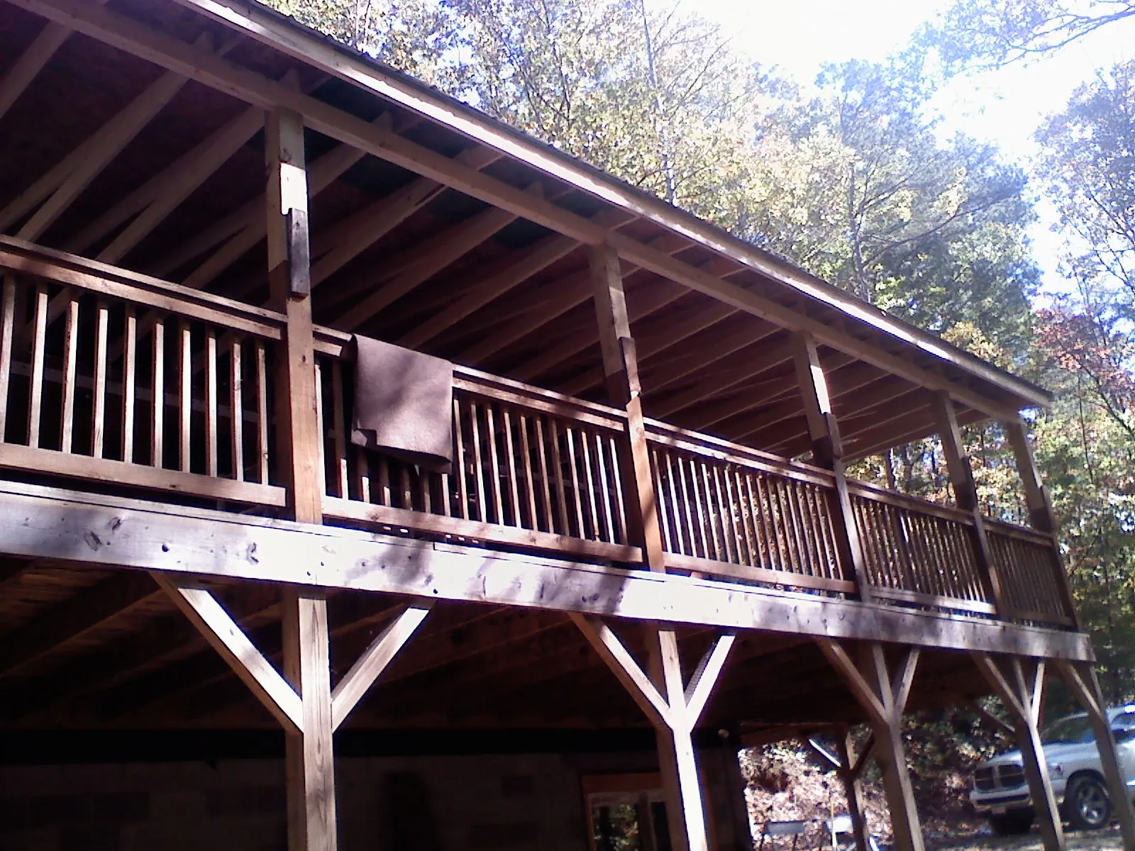 Timber framing under a new elevated porch and deck — Roof Leak Repair in Renfrew by Roofing Brothers